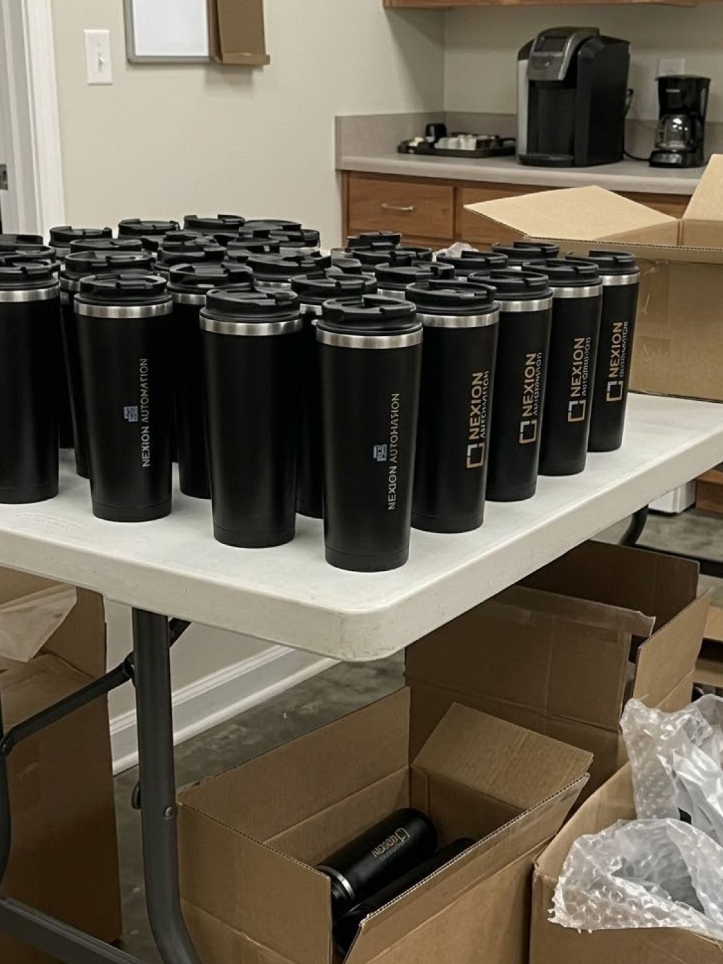 Nexion Automation insulated travel mugs