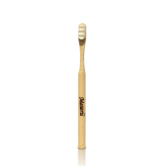 Beige bamboo toothbrush with 20,000 nano soft bristles, eco-friendly
