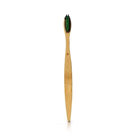 Eco-friendly beige bamboo toothbrush with charcoal neem bristles for natural whitening